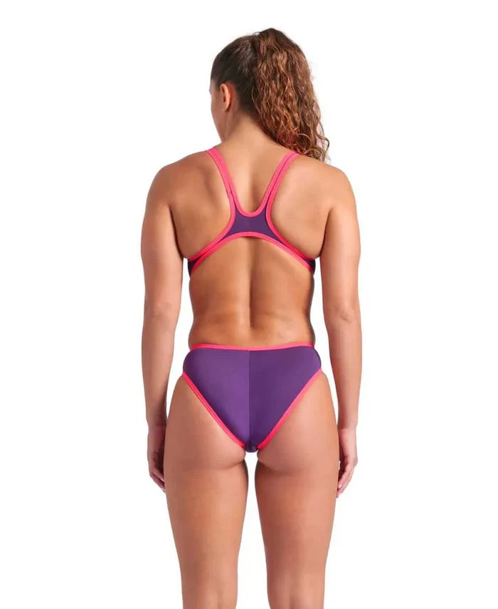 Arena women's one-piece swimsuit with big logo in plum and bright coral, featuring a sleek, fitted design and adjustable straps.
