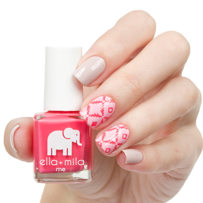 Ella's Pick coral pink nail polish with pink lace pattern accent nails