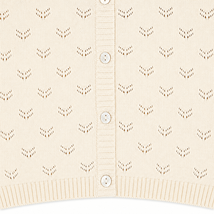 close up of Milan Pointelle Knit Ruffle Baby Cardigan Sweater (Organic)
