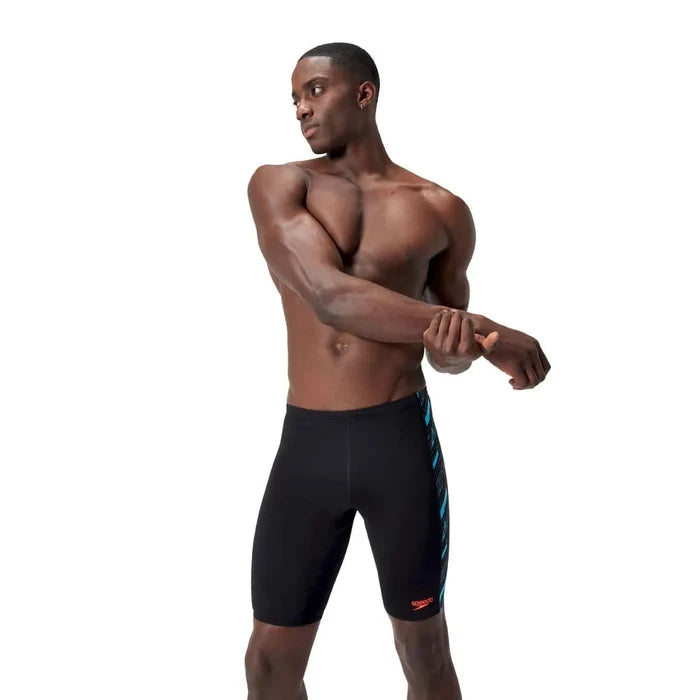 Speedo men's HyperBoom Panel jammer swimwear in black, Picton Blue, and Siren Red with panel design for competitive swimming.