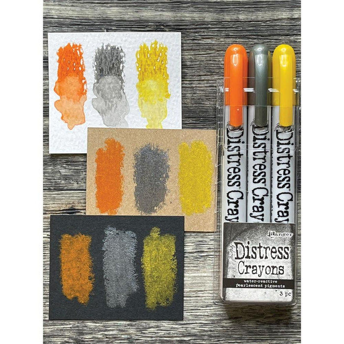 Tim Holtz - Distress Crayon - Pearl Set Halloween - Set# 1. Distress Crayons are formulated to achieve vibrant pearlescent coloring effects on porous surfaces for mixed-media. The smooth water-reactive pigments are ideal for creating brilliant backgrounds, water coloring, smudge effects and more! Available at Embellish Away located in Bowmanville Ontario Canada.