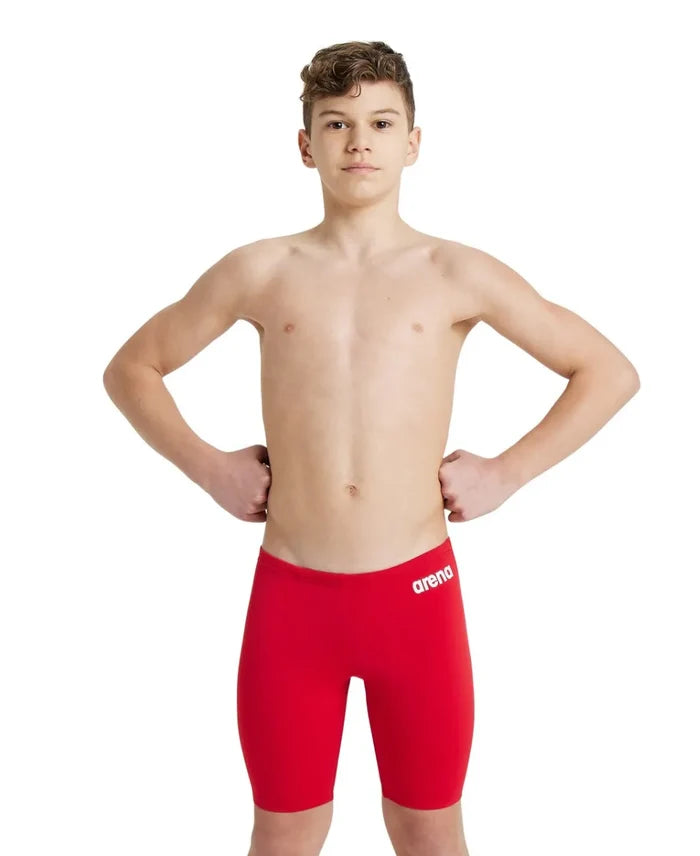 Arena boys' team swim solid jammer, navy blue, stretchy swimwear designed for competitive swimming and training.