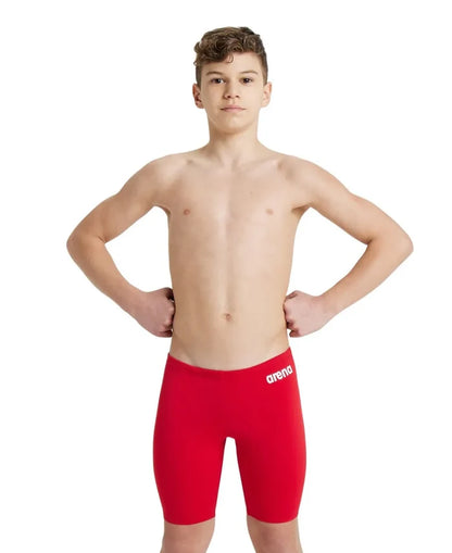 Arena boys' team swim solid jammer, navy blue, stretchy swimwear designed for competitive swimming and training.
