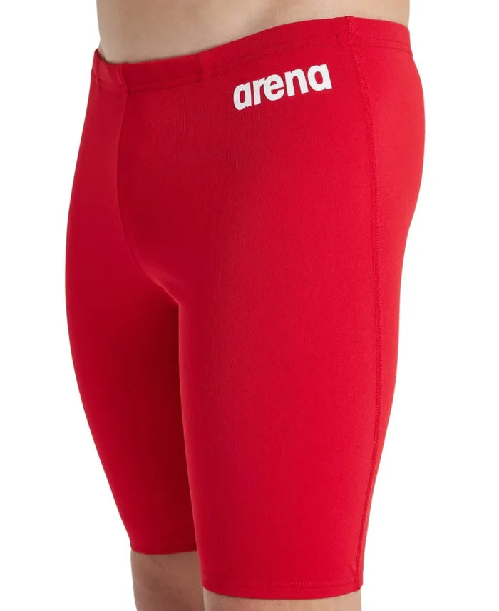 Arena boys' team swim solid jammer, close-up of blue waterproof swimwear designed for young competitive swimmers.