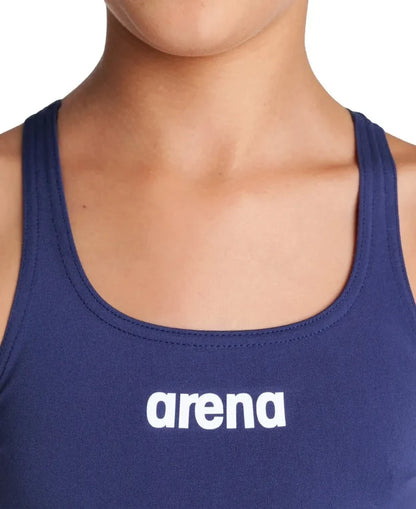 Arena Girls Team Swim Pro solid navy blue swimsuit, designed for young swimmers, featuring a sleek, comfortable fit and durable fabric.