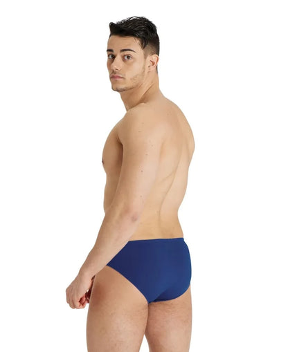 Arena men's team swim solid briefs in navy blue, featuring a snug fit and quick-drying fabric for competitive swimming.