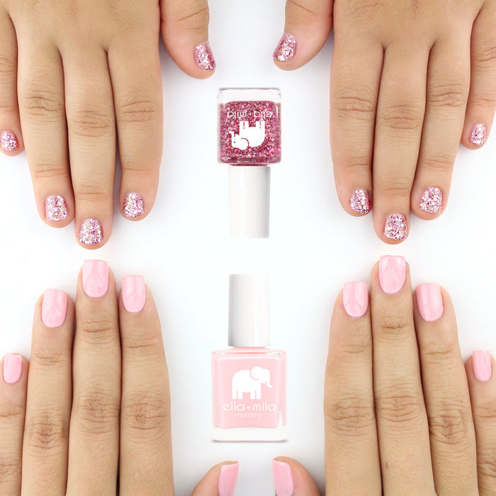 Mommy & Me Blushing Dreams and Starbright nail polish on an adult and child's hands
