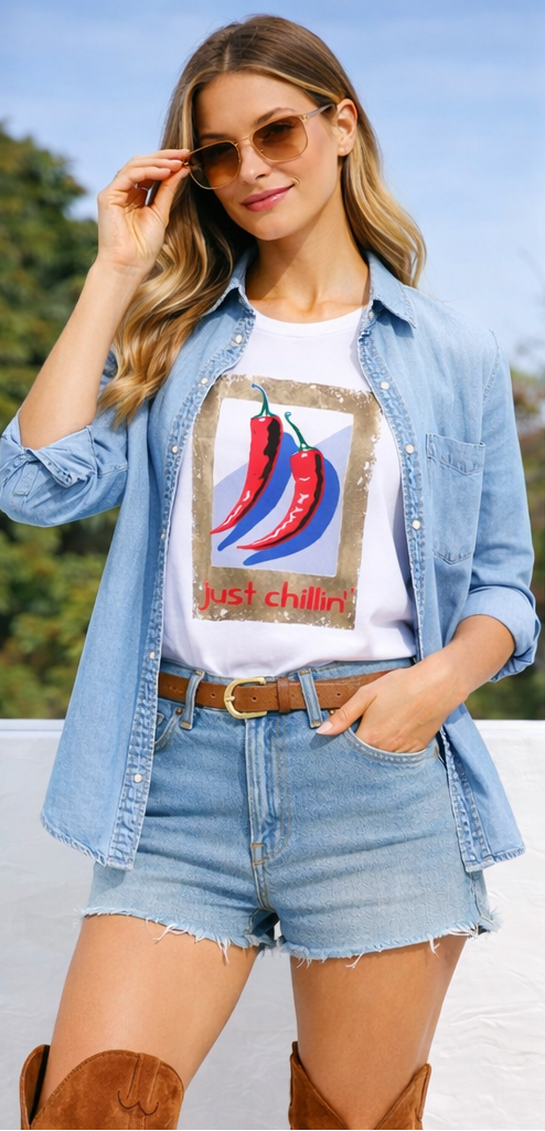 Three women wearing a t-shirt with a chili pepper graphic design.