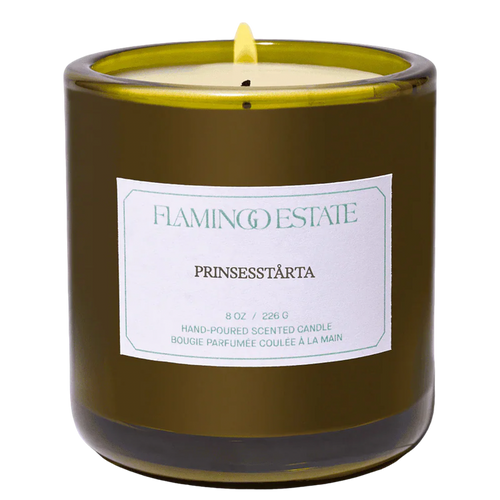 Flamingo Estate Green glass candle vessel with a white label prinsesstarta fragrance label 8oz