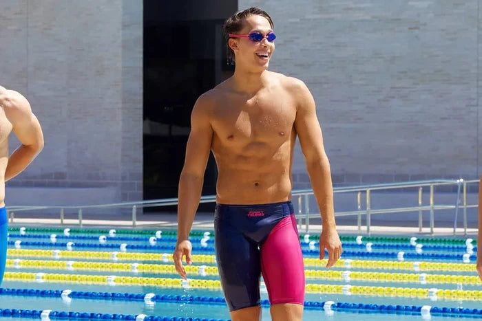 Funky Trunks men's Tidal Blast Apex Viper jammer swimwear in navy and pink, featuring a sleek, fitted design for competitive swimming.