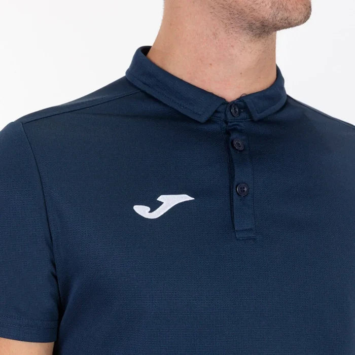 Navy Joma boys' hobby polo shirt, short-sleeve T-shirt with collar, made for casual wear, featuring the Joma logo.