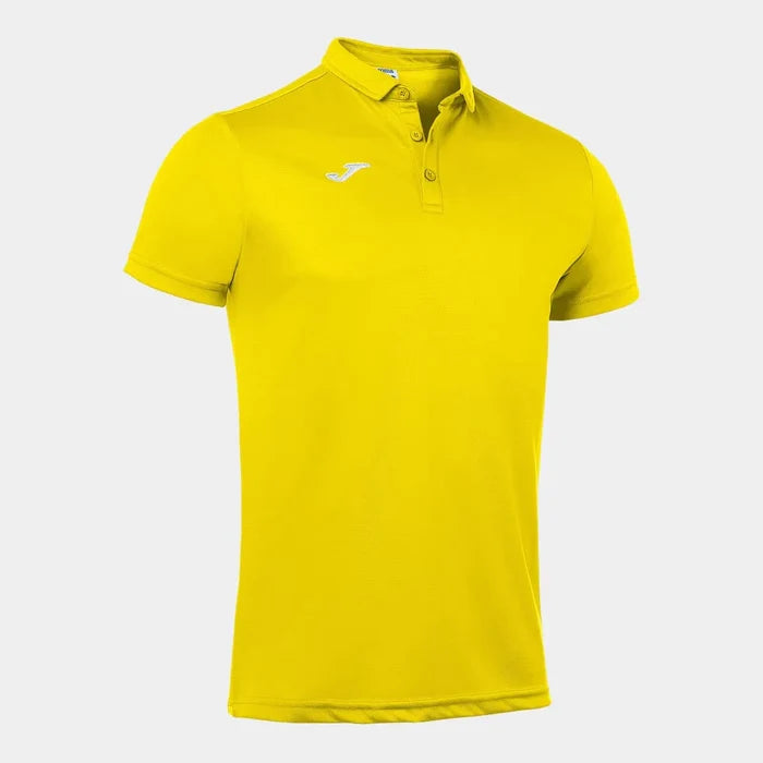 Joma boys' yellow Hobby polo shirt made of soft fabric, featuring a classic collar and button placket for casual wear