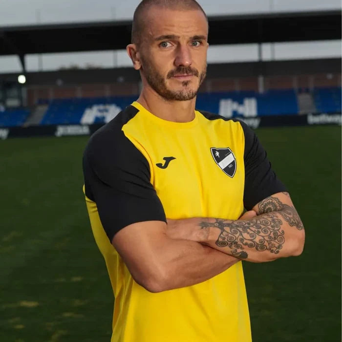 Yellow and black Joma Men's Academy IV T-Shirt, casual fit, lightweight fabric, front logo, for sports and everyday wear.