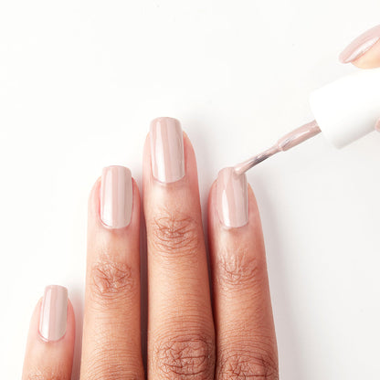 Applying Light to the Touch light neutral nude nail polish