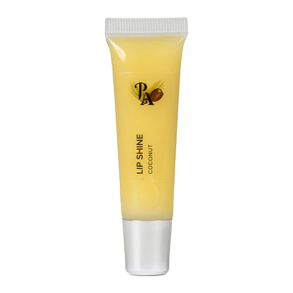 A tube of Pure Anada Lip Shine with a yellow tint, labeled 'LIP SHINE COCONUT', indicating a creamy coconut scent for the lip gloss.