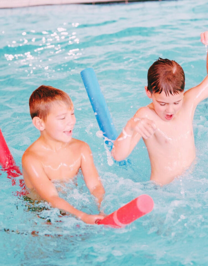Blue comfy swimming noodle bat with red handle for water play