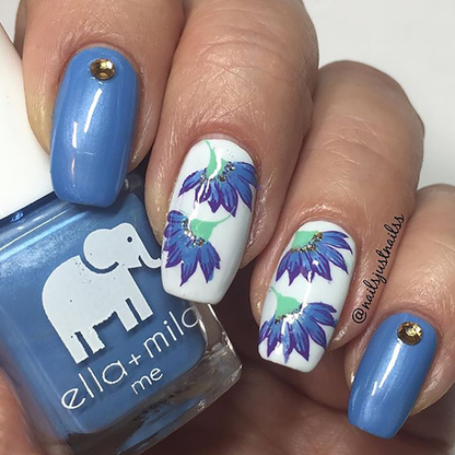 My Pool Party blue nail polish with purple floral accent nail art
