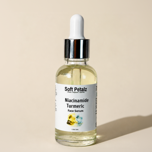 Bottle of Soft Petalz Niacinamide Turmeric Face Serum on a beige background