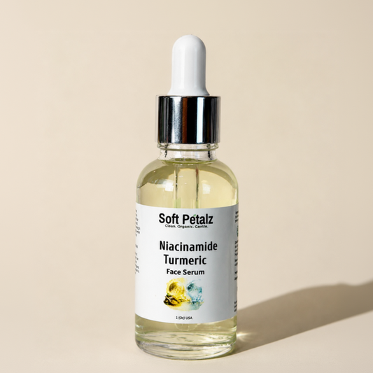 Bottle of Soft Petalz Niacinamide Turmeric Face Serum on a beige background