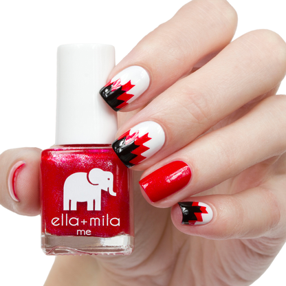 No Place Like Home ruby red nail polish with black and white paint splatter nail art