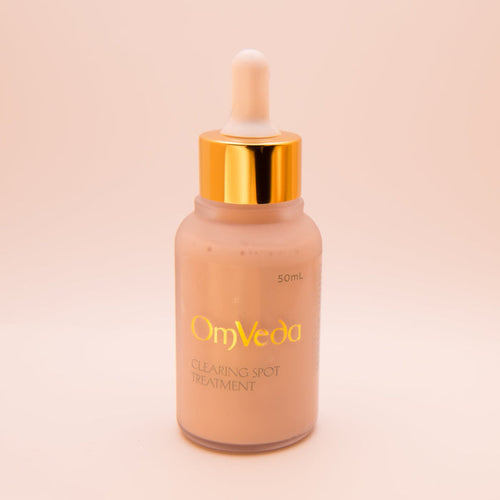 OmVeda 50ml clearing spot treatment bottle with gold dropper cap
