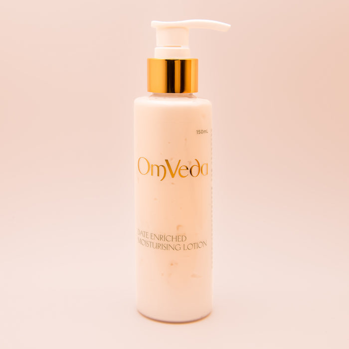 OmVeda date-enriched moisturizing lotion bottle with gold pump, 150 ml