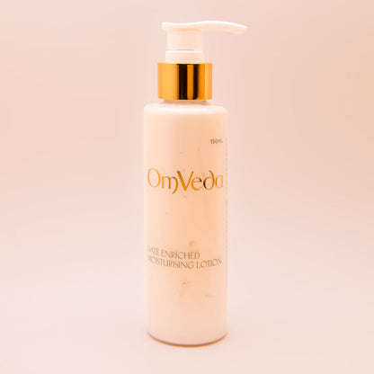 OmVeda date-enriched moisturizing lotion bottle with gold pump, 150 ml