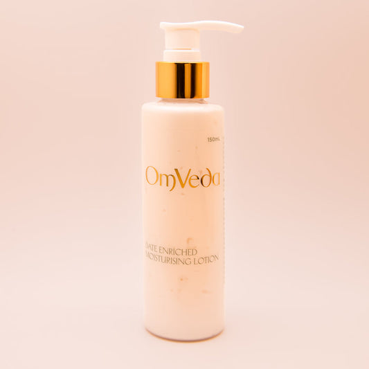 OmVeda date-enriched moisturizing lotion bottle with gold pump, 150 ml