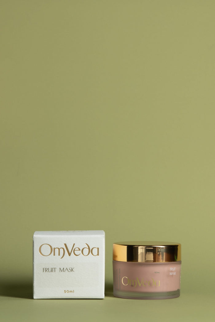 OmVeda Fruit Mask 50ml jar and white product box, gold lid