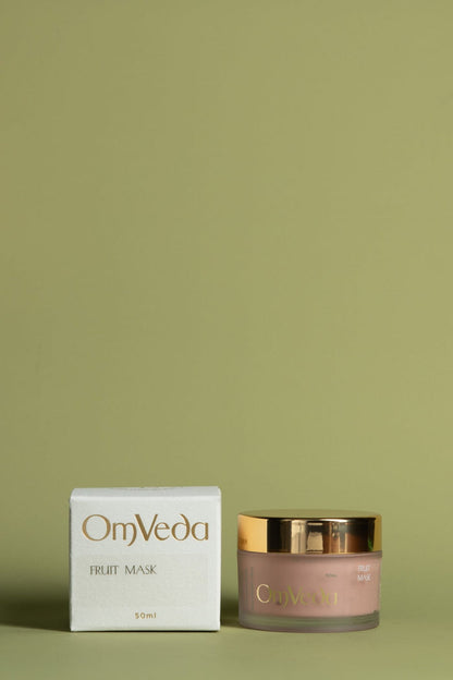 OmVeda Fruit Mask 50ml jar and white product box, gold lid