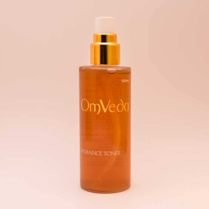 OmVeda Radiance Toner 100ml amber toner bottle with gold cap