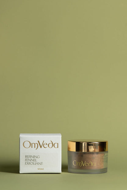 OmVeda refining fennel exfoliant box and jar, 50ml, with gold lid.