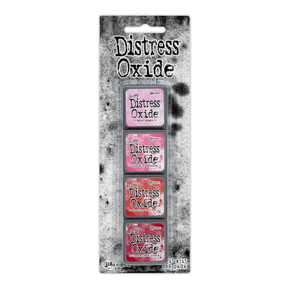 Ranger - Tim Holtz - Distress Mini Oxide Ink Pads Kit, #1 (4pc). Colours: Spun Sugar, Picked Raspberry, Festive Berries and Lumberjack Plaid. Available at Embellish Away in Bowmanville Ontario Canada.