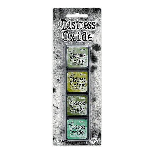 Ranger - Tim Holtz - Distress Mini Oxide Ink Pads Kit, #3 (4pc). Colours: Bundled Sage, Crushed Olive, Peeled Paint and Cracked Pistachio. Available at Embellish Away in Bowmanville Ontario Canada.