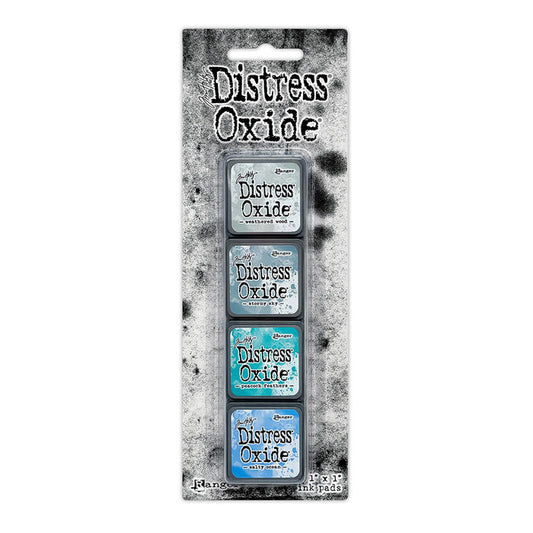 Ranger - Tim Holtz - Distress Mini Oxide Ink Pads Kit, #4 (4pc). Colours: Weathered Wood, Stormy Sky, Peacock Feathers and Salty Ocean. Available at Embellish Away in Bowmanville Ontario Canada.