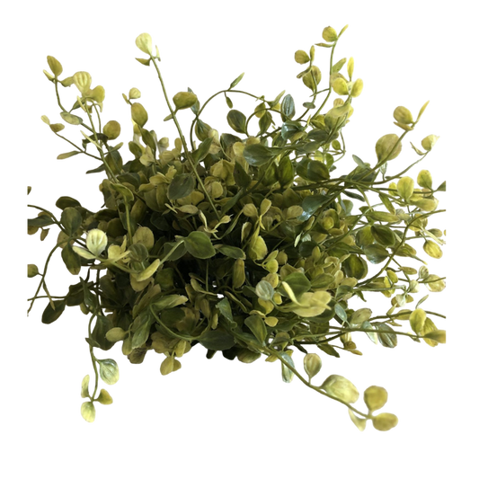Artificial green foliage on a white background