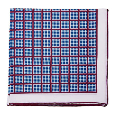 A tailor-made Sovereign Grade White/Burgundy Quadrant Silk Pocket Square provided by KirbyAllison.com, adding a refined touch to your ensemble, set against a white background.