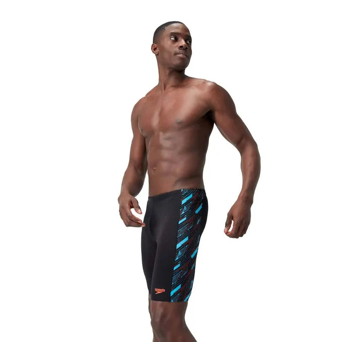 Speedo men's HyperBoom panel jammer swimsuit in black, Picton Blue, and Siren Red, designed for competitive swimming.