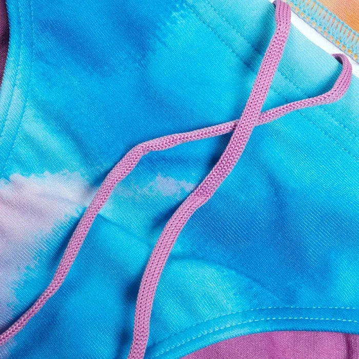 Speedo women's allover digital hipster brief in Kiki Pink, Lemon Drizzle, and Picton Blue, featuring colorful, patterned swimwear bottoms.