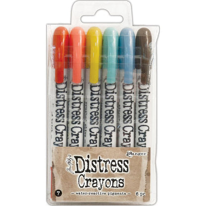 Tim Holtz - Distress Crayon Set - Set #7. Tim Holtz-Distress Crayon Set: Set #7. Distress Crayons are formulated to achieve vibrant coloring effects on porous surfaces for mixed-media. The smooth water-reactive pigments are ideal for creating brilliant backgrounds, watercoloring, smudge effects and more! Available at Embellish Away located in Bowmanville Ontario Canada.