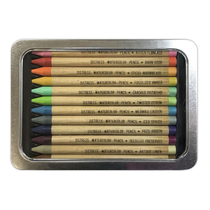 Tim Holtz - Distress Watercolor Pencils 12/Pkg Set 2. These are woodless watercolor pencils formulated to achieve vibrant coloring effects on porous surfaces. Water-reactive pigments are ideal for water coloring, shading, sketching, etc. Available at Embellish Away located in Bowmanville Ontario Canada.