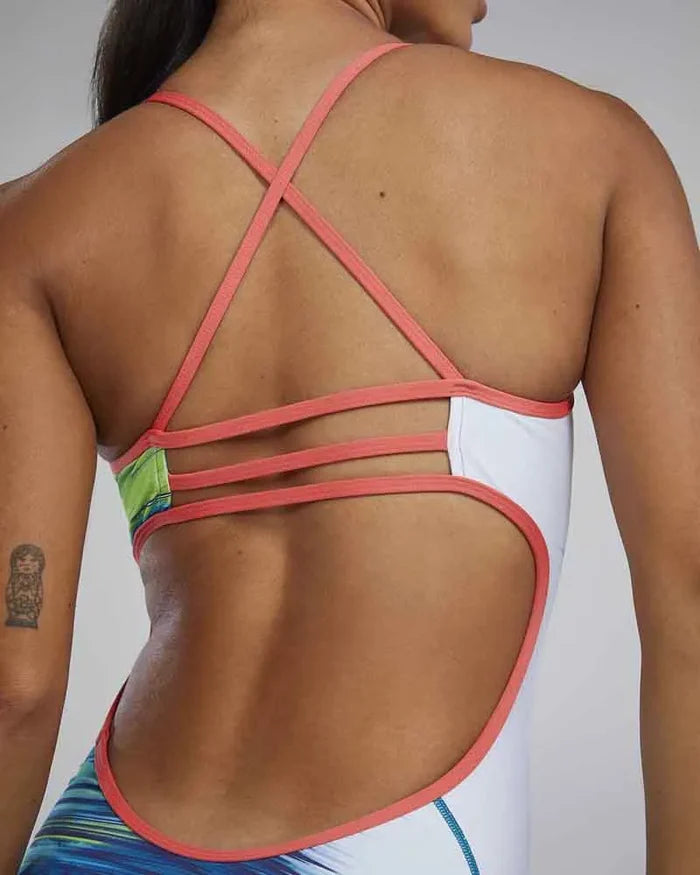 TYR women's Bravura Trinityfit swimsuit in white and multi-color, featuring a sleek design and supportive fit for swimming.