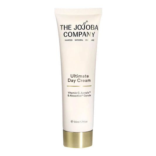 Tube of 'The Jojoba Company' Ultimate Day Cream on a white background