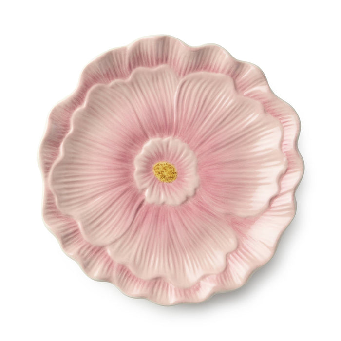 Pink floral ceramic plate on a white background